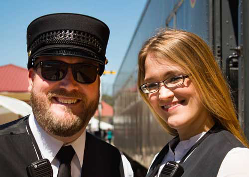 Smiling Conductor and Car Host